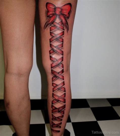 back of leg bow tattoo